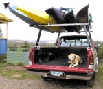 Universal Truck Rack.  Set of two racks attach to most pickup trucks by clamping to the bed rails.  Carries two canoes or multiple kayaks. Loading bars make it easy for one person to load boats. Made in the USA